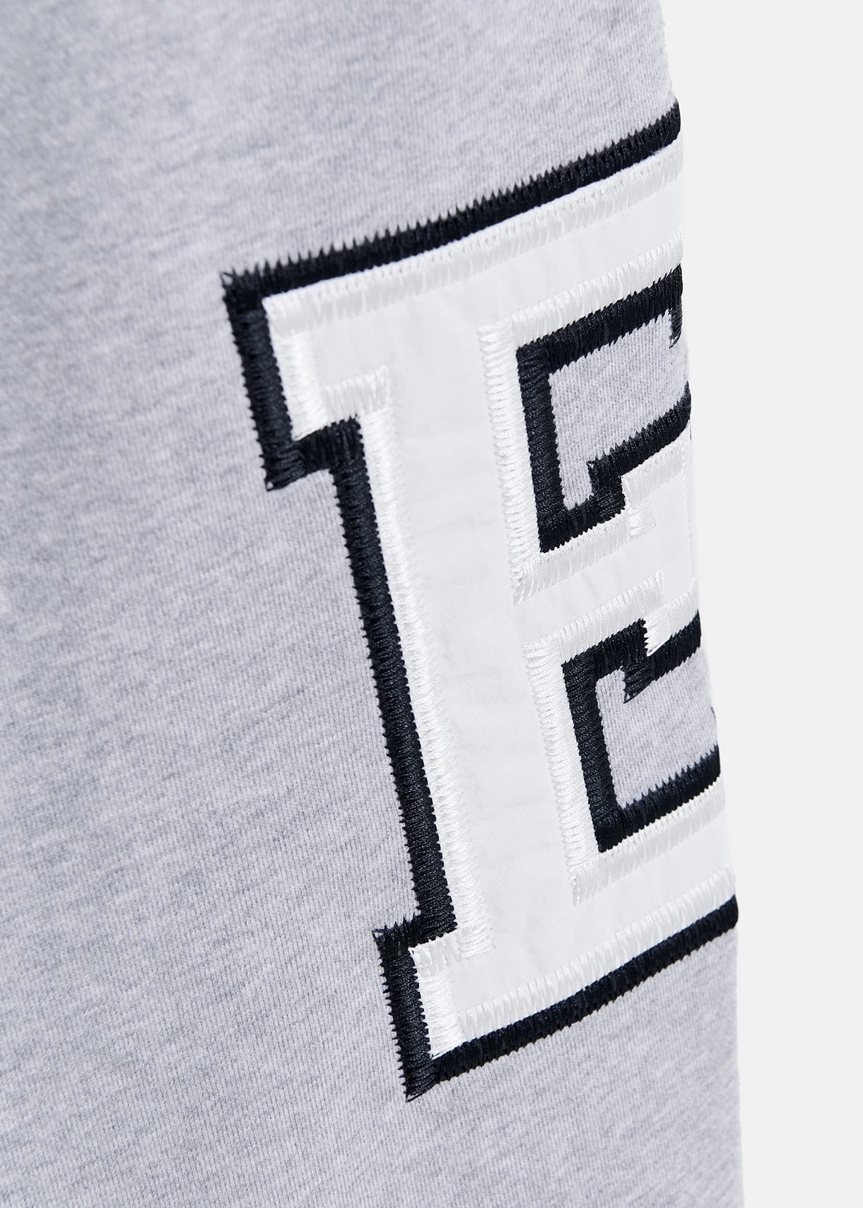 Grey cotton sweatpants with embroidered patches | Essentiel