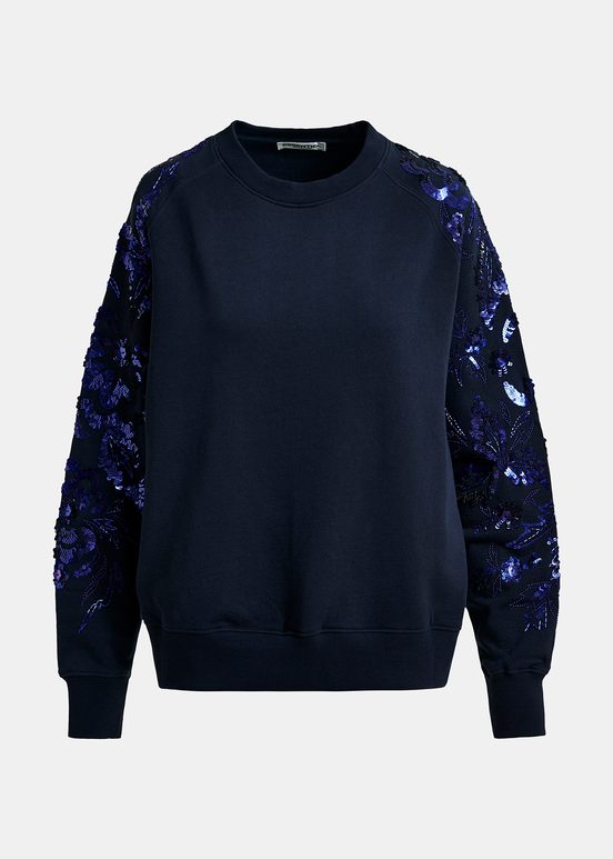 Marineblauwe biokatoenen sweater met pailletten en kralen op de mouwen