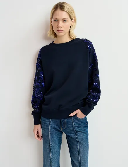 Felpa blu navy in cotone biologico con maniche ricamate in paillettes e perline