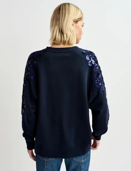 Navy blue organic cotton sweatshirt with sequin and bead-embroidered sleeves