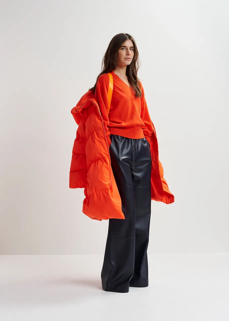 Orange hooded puffer coat