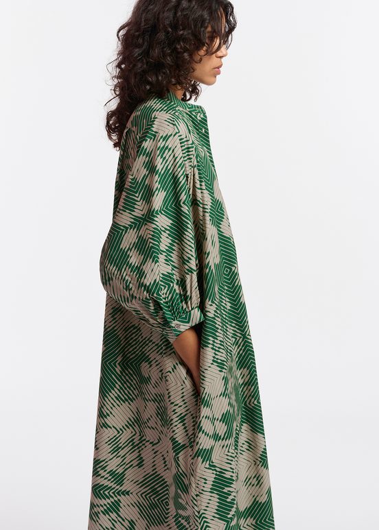 Beige and dark green maxi-length dress with geometric print