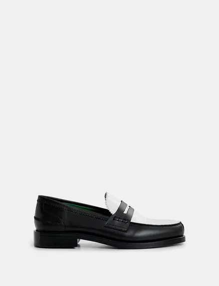 Black and white leather loafers