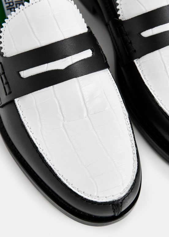 Black and white leather loafers