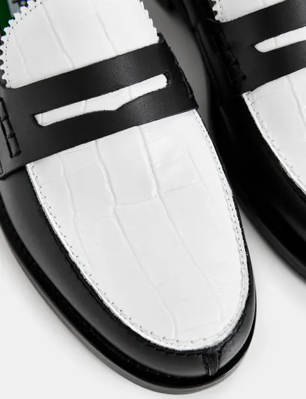 Black and white leather loafers