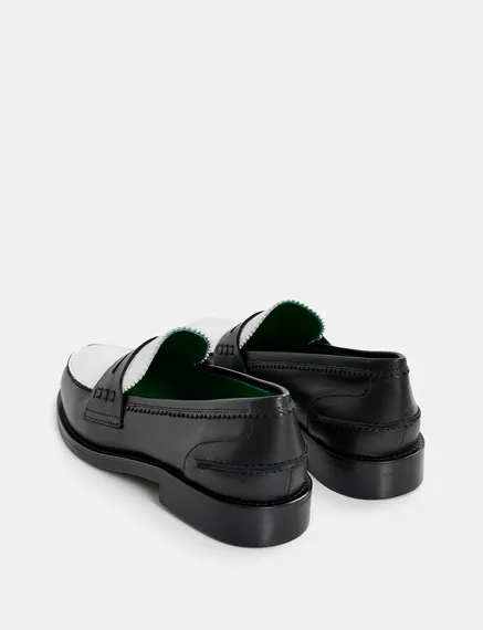 Black and white leather loafers