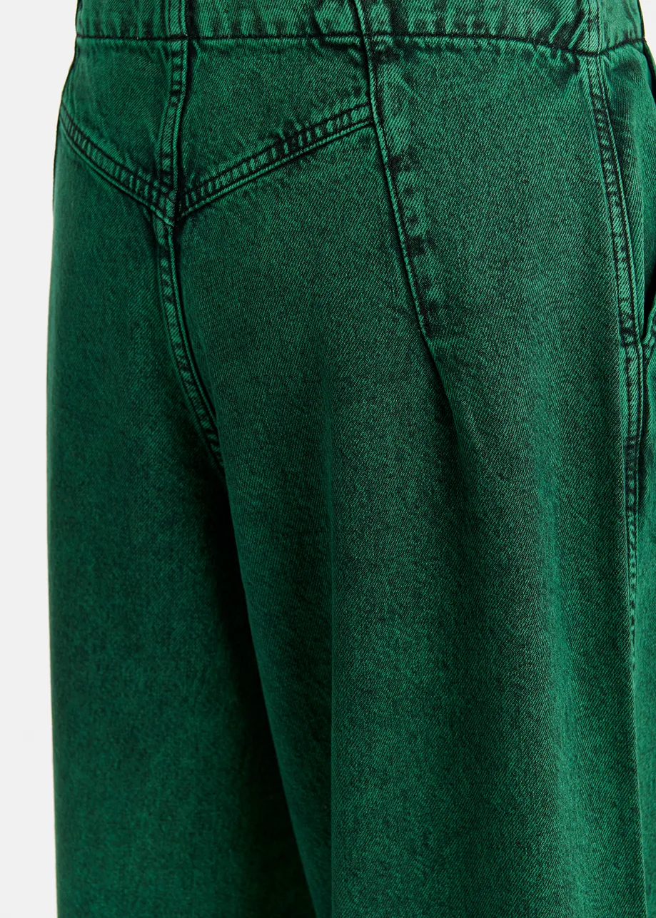 Jean large en denim surteint en vert foncé