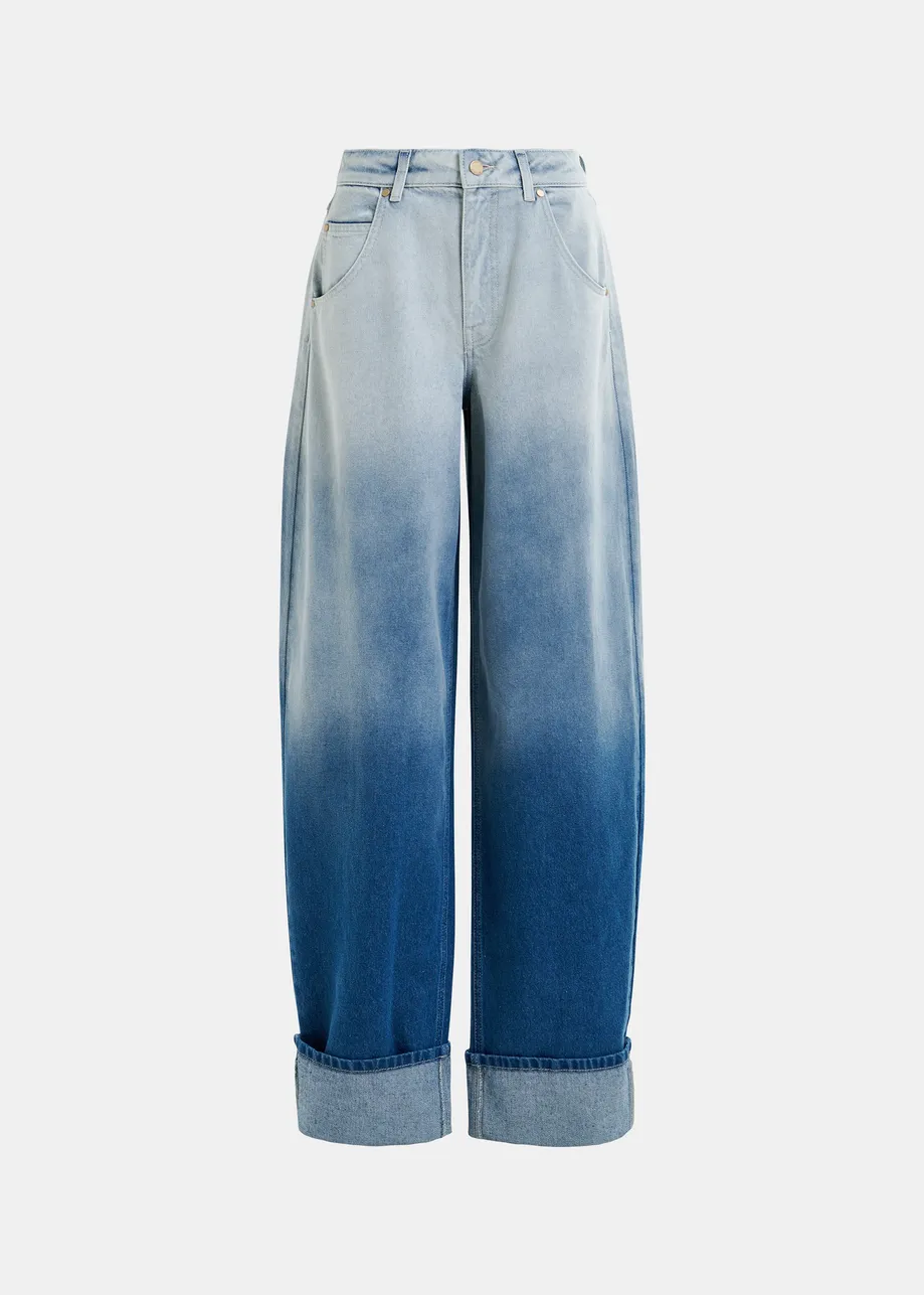 Blue balloon-fit jeans with folded cuffs and tie-dye effect