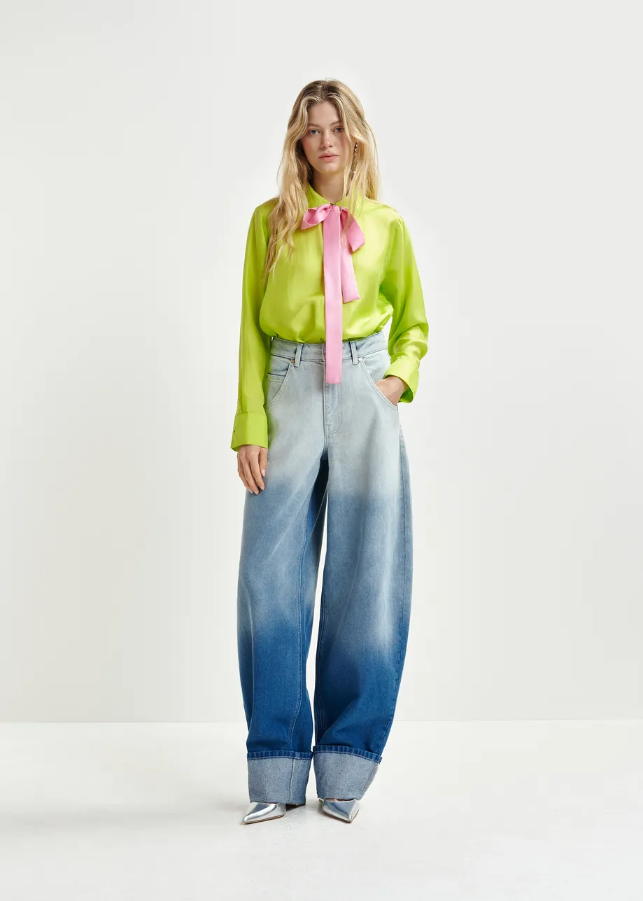 Blue balloon-fit jeans with folded cuffs and tie-dye effect