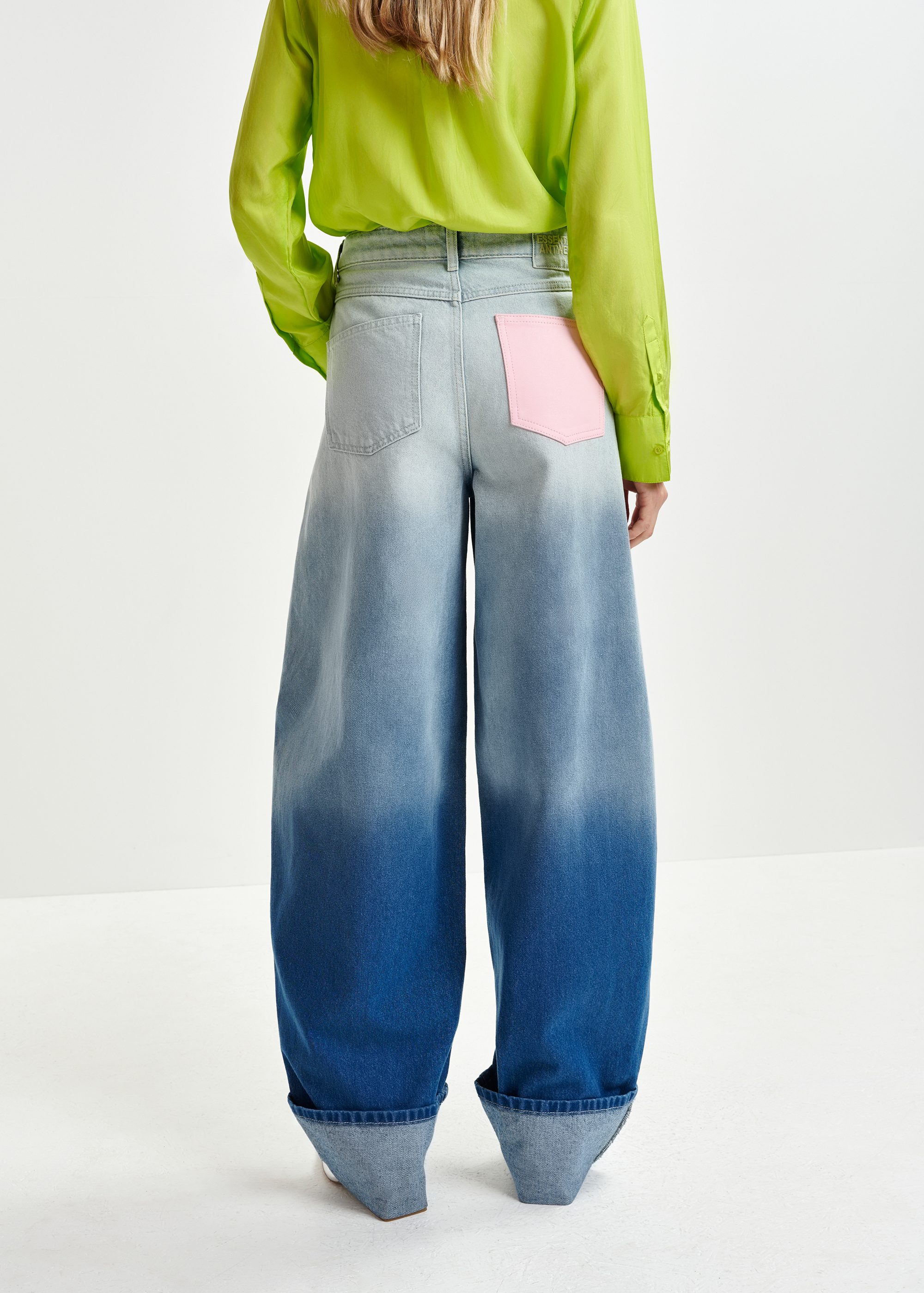 Blue balloon-fit jeans with folded cuffs and tie-dye effect
