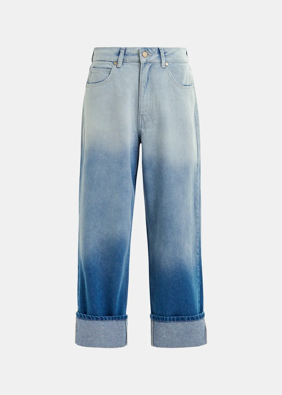 Blue boyfriend jeans with folded cuffs and tie-dye effect