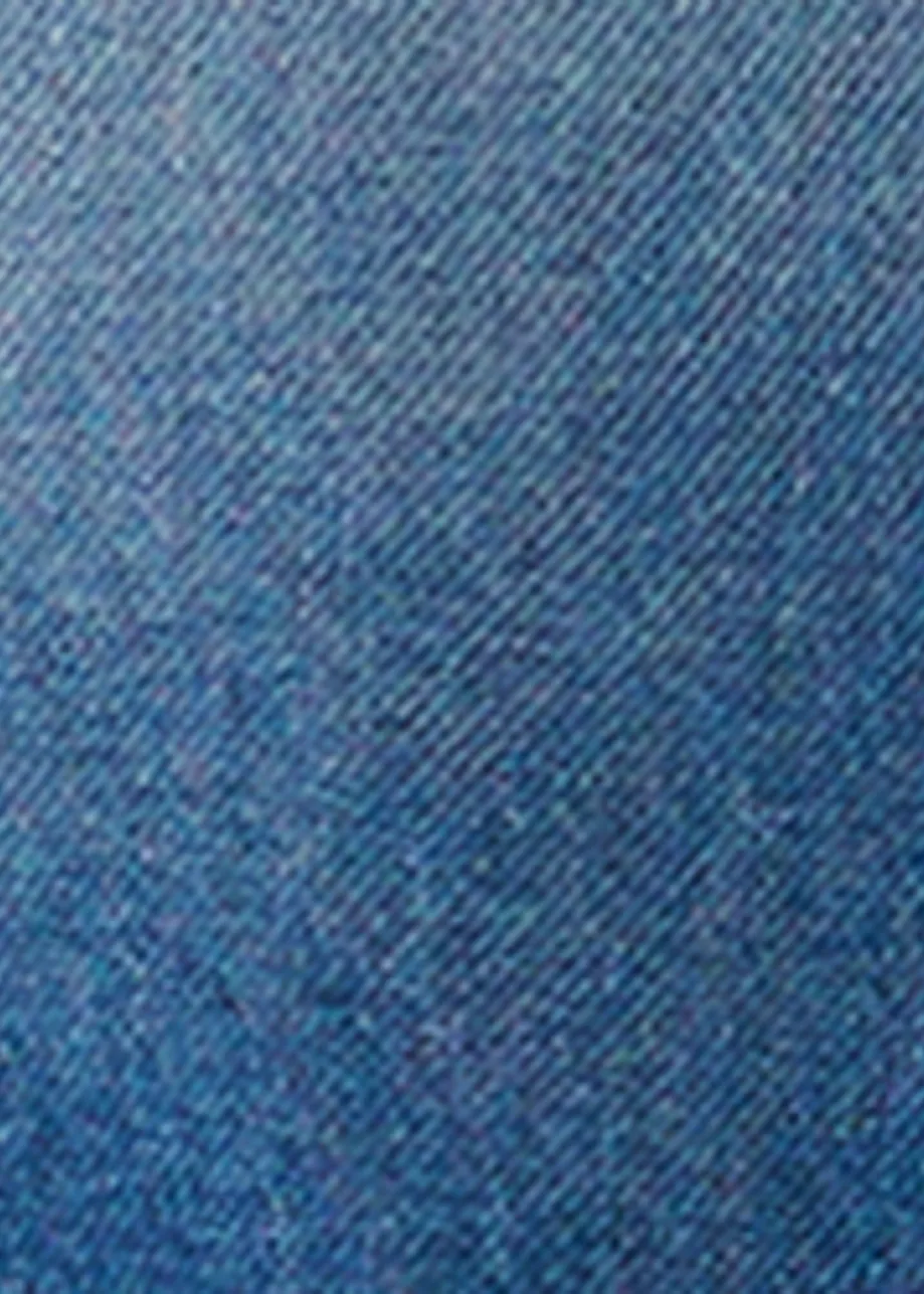 Blue boyfriend jeans with folded cuffs and tie-dye effect