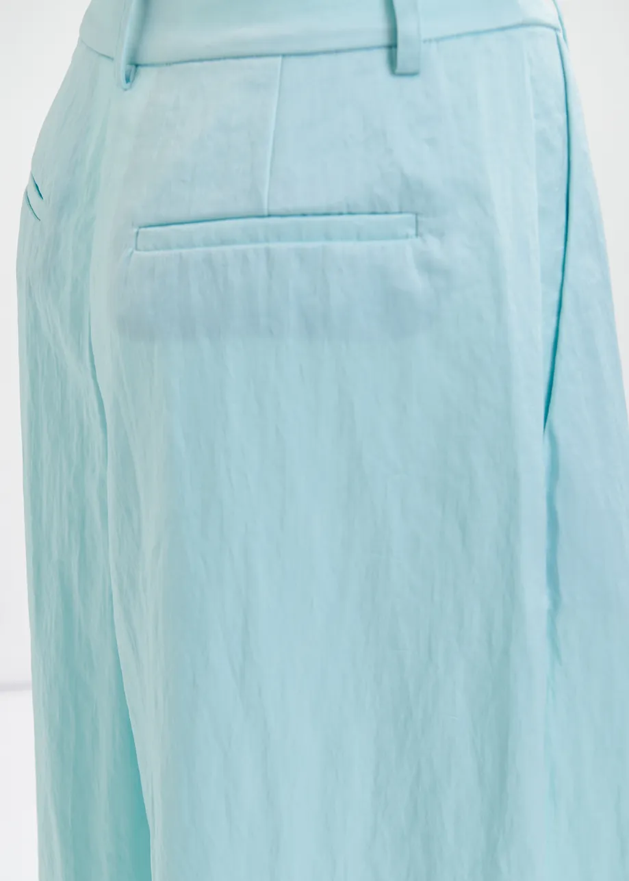 Light blue wide-leg satin pants