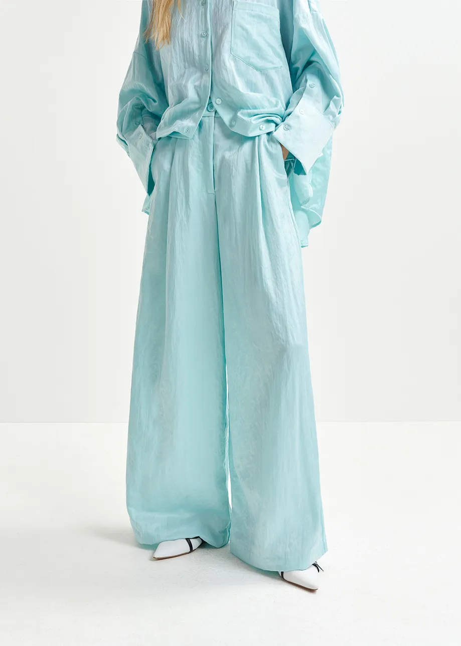 Light blue wide-leg satin pants