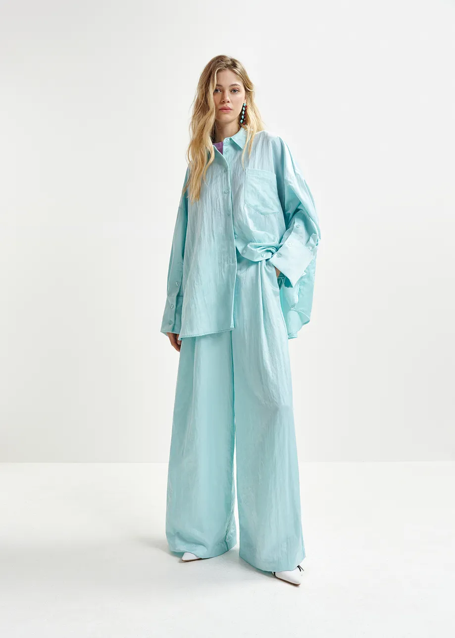 Light blue wide-leg satin pants