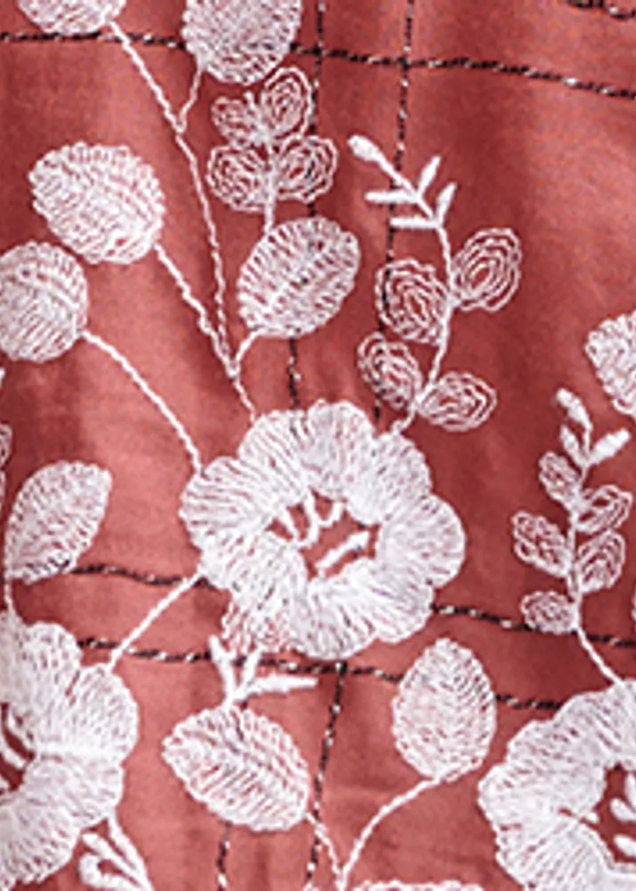 Brown and white check pattern shirt with floral embroidery and a scalloped hemline