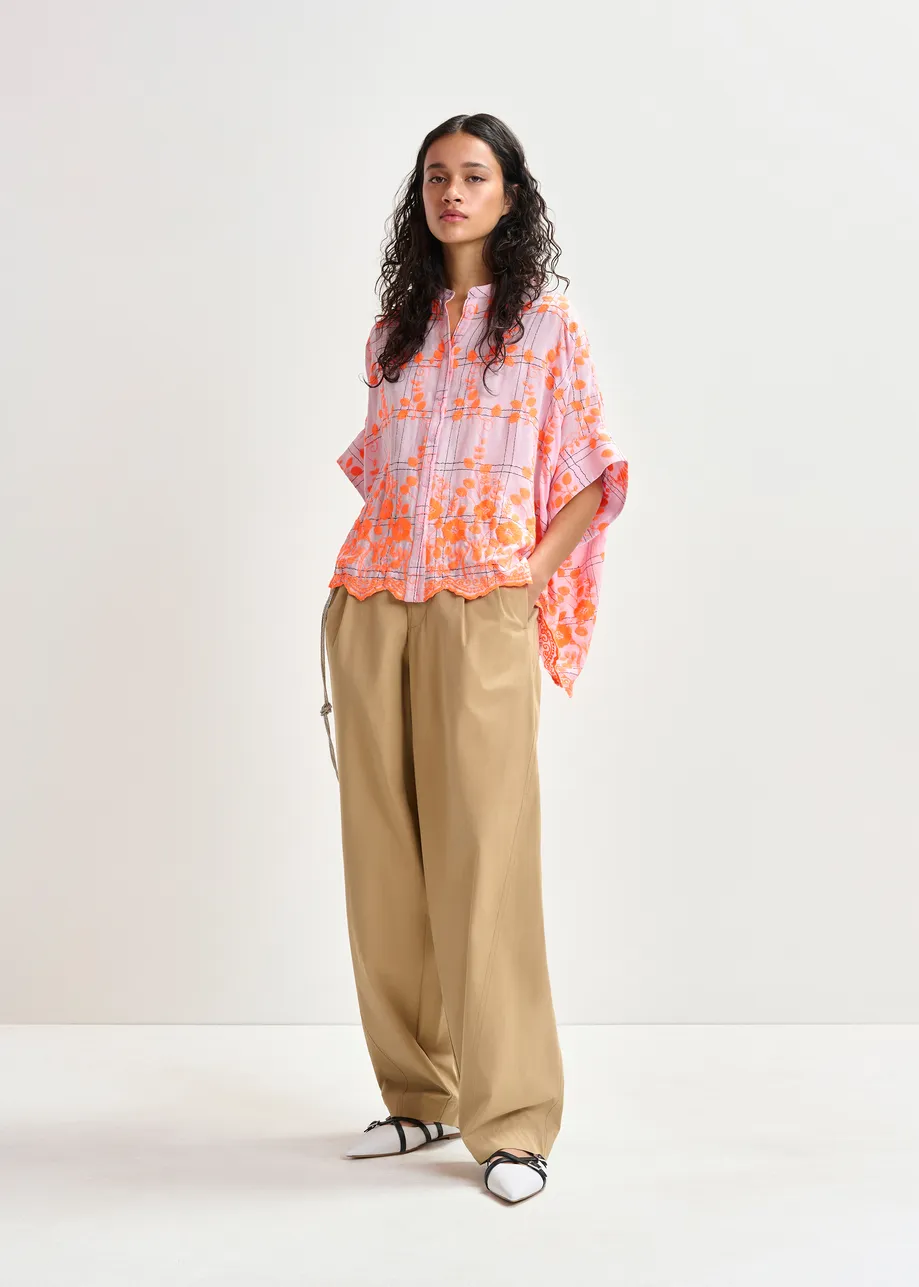 Light pink and orange check pattern shirt with floral embroidery and a scalloped hemline