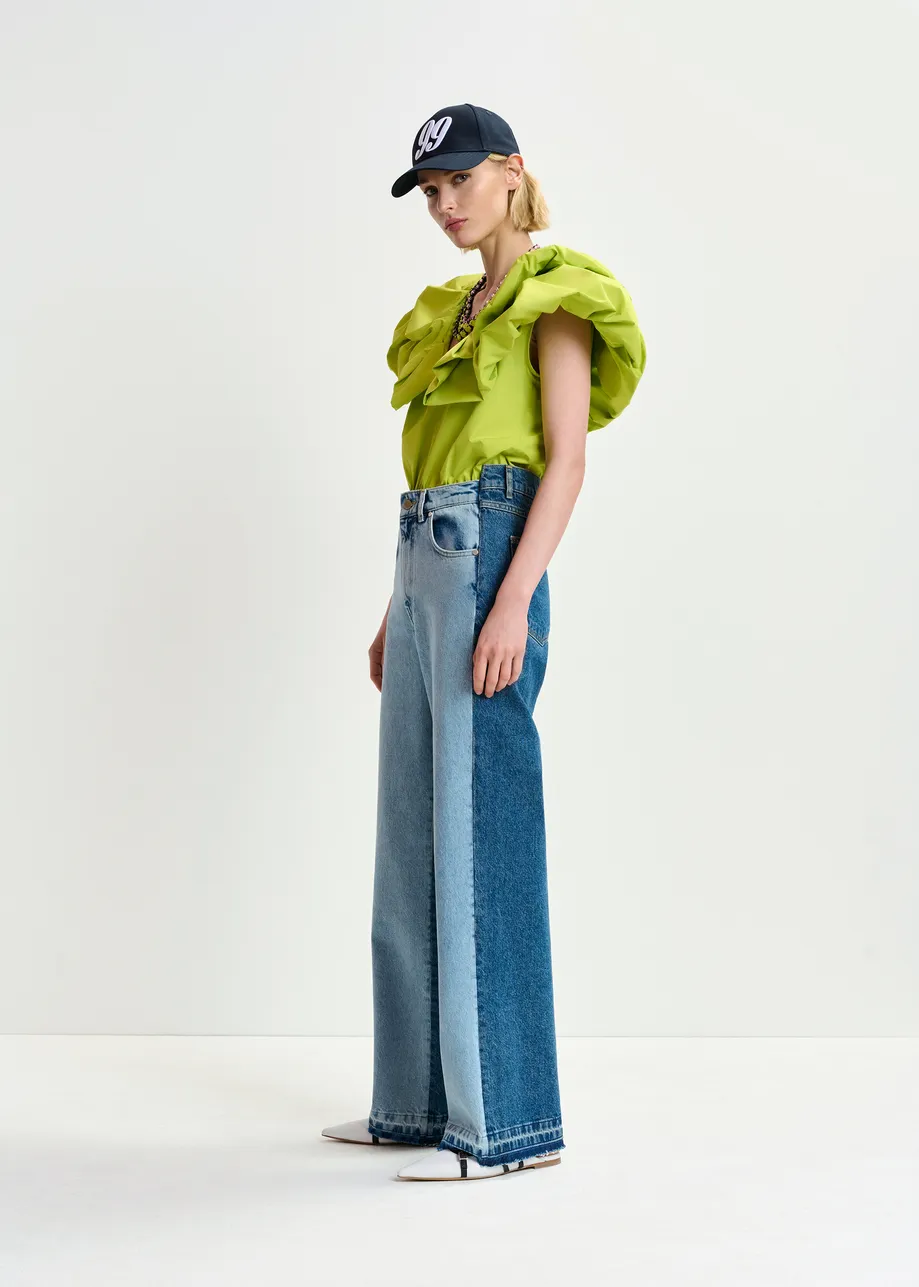 Light and dark blue contrasting panel jeans with uneven waistline and raw-cut hemline