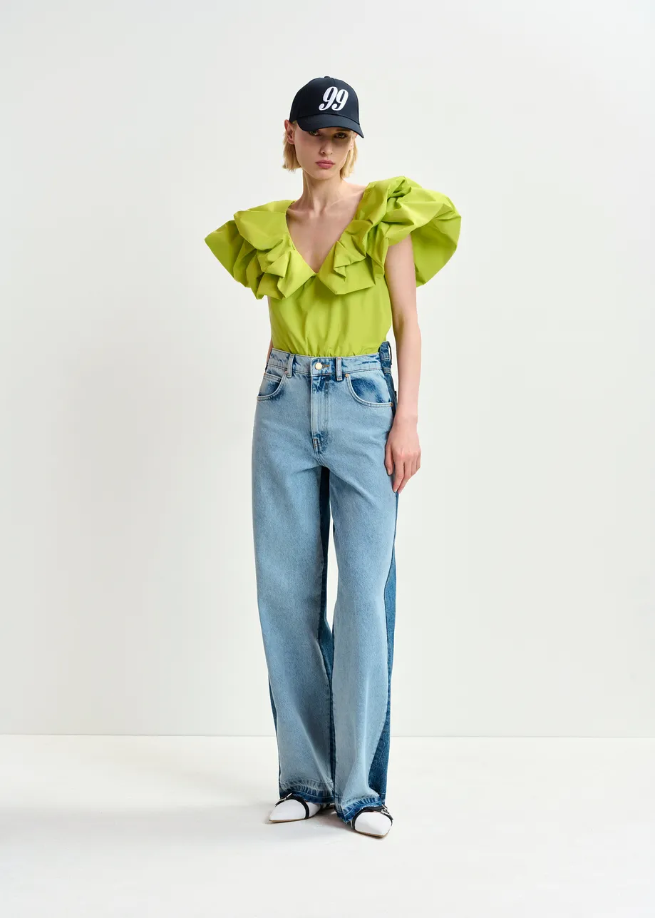 Light and dark blue contrasting panel jeans with uneven waistline and raw-cut hemline