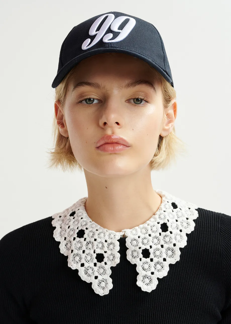 Black ribbed knitted polo top with removable lace collar