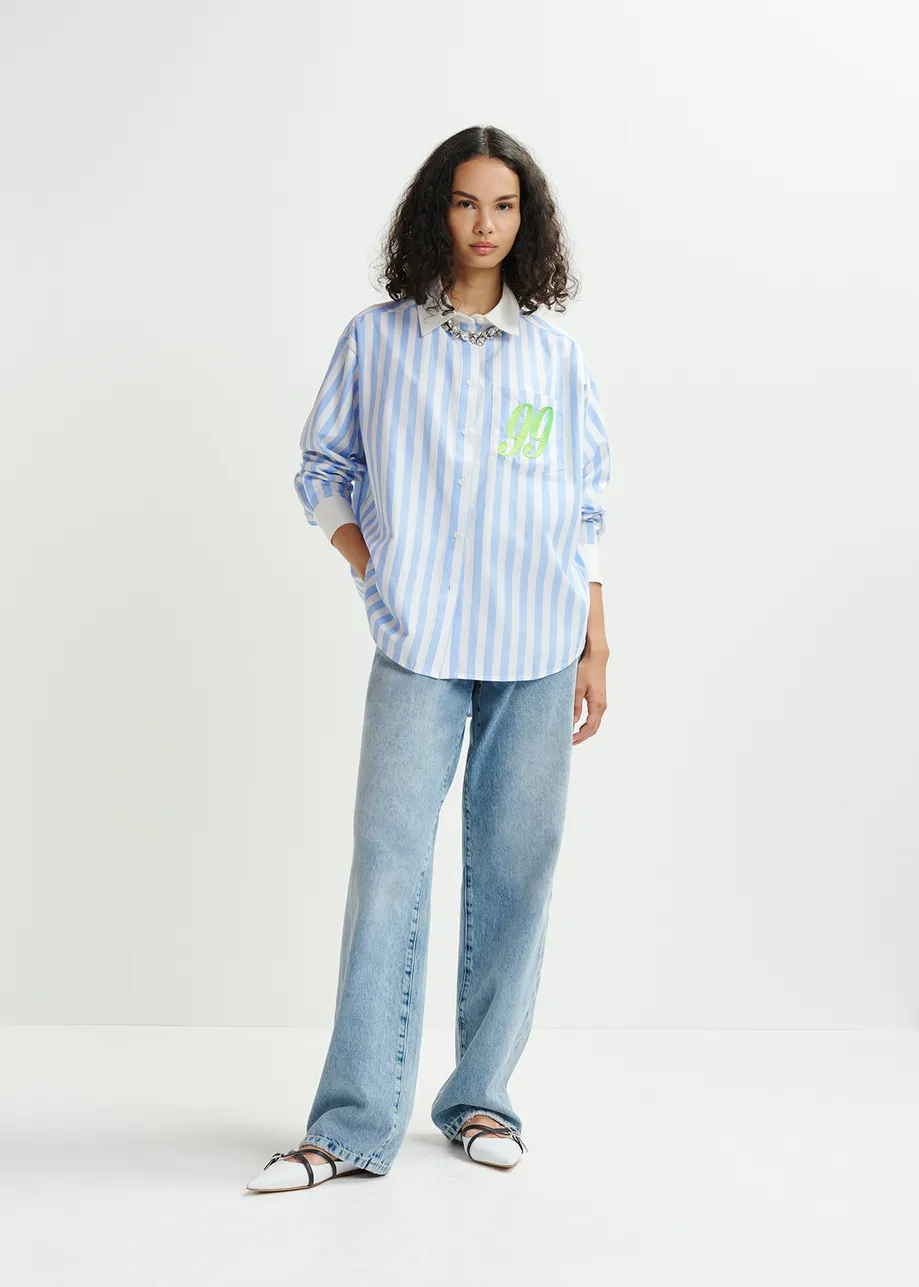 Blue, white and green striped shirt with '99' embroidery