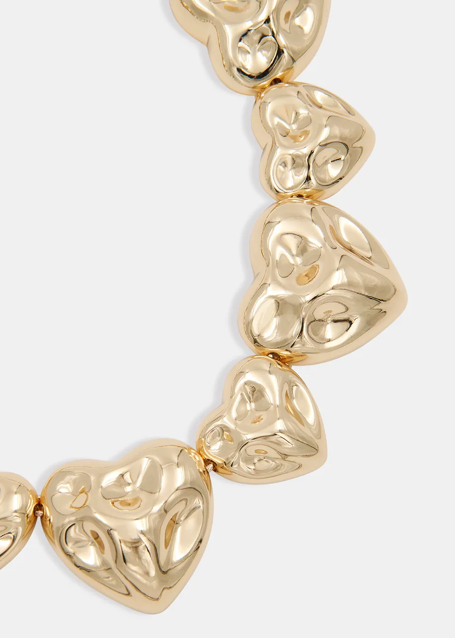 Gold-tone necklace with textured hearts