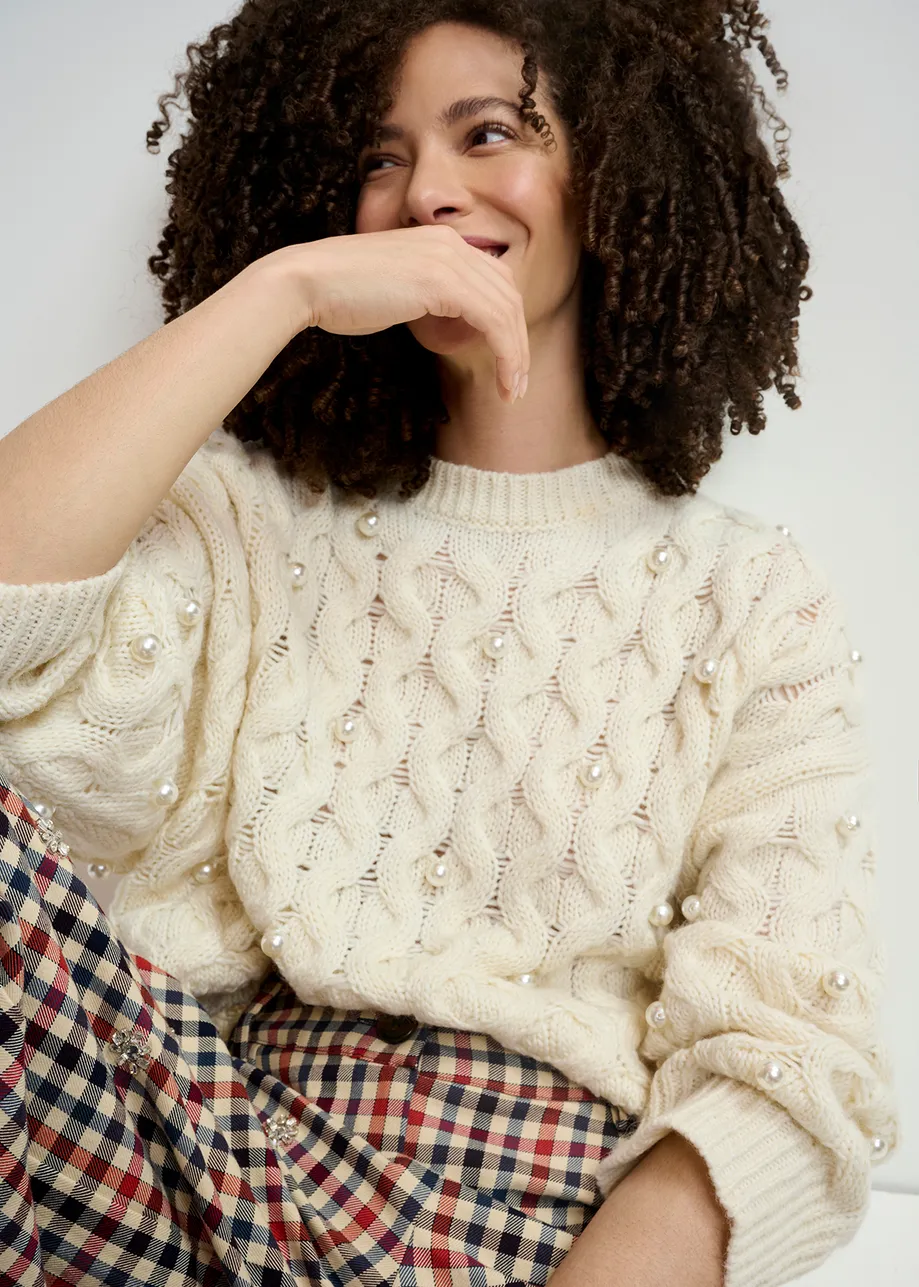 Ecru cable knitted sweater with pearl embellishments