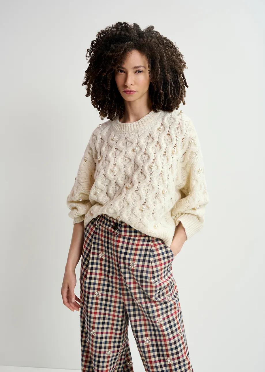 Ecru cable knitted sweater with pearl embellishments