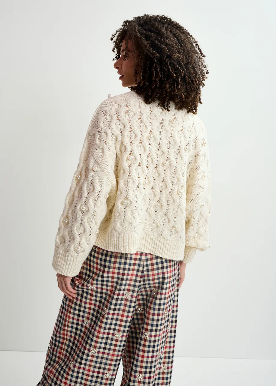 Ecru cable knitted sweater with pearl embellishments