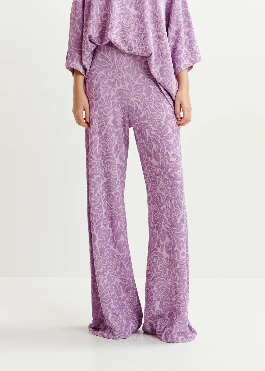 Pantalon évasé en maille jacquard fleurie violet et mauve