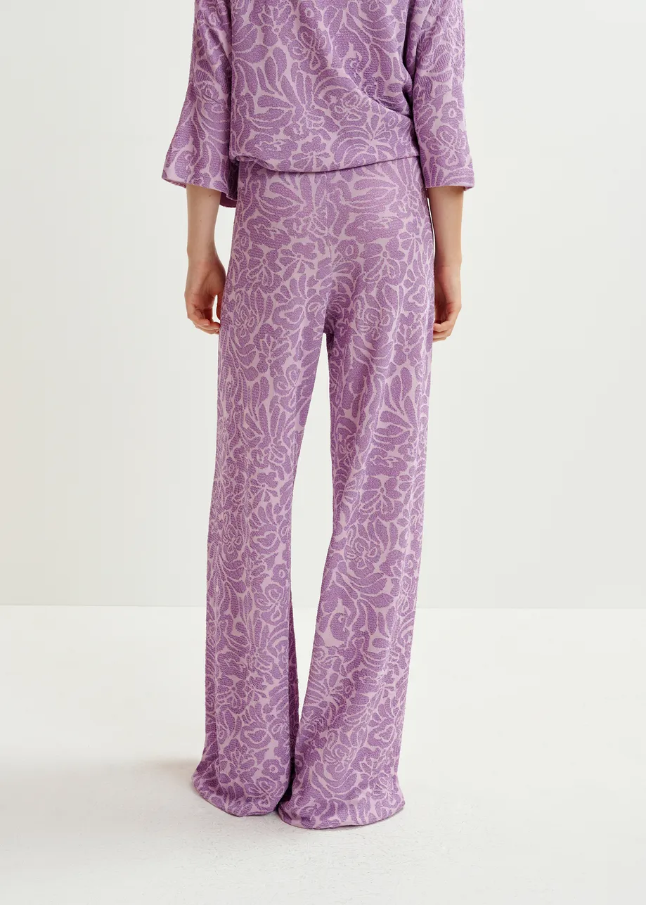 Pantalon évasé en maille jacquard fleurie violet et mauve