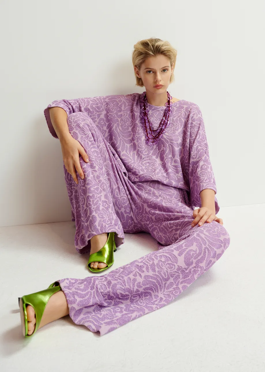 Purple and mauve floral jacquard-knit flared leg pants