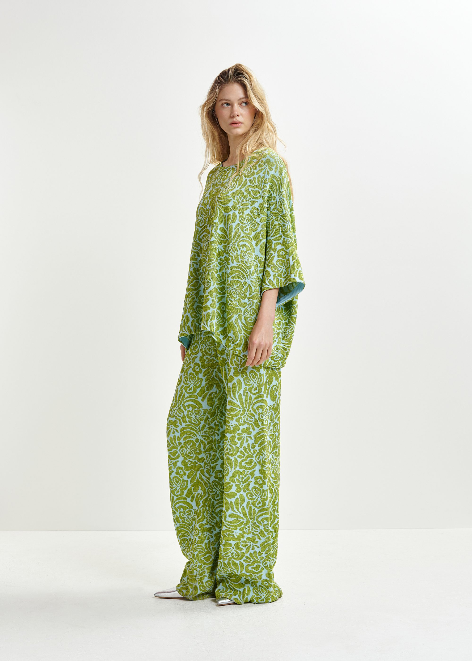 Green and blue floral jacquard-knit flared leg pants | Essentiel
