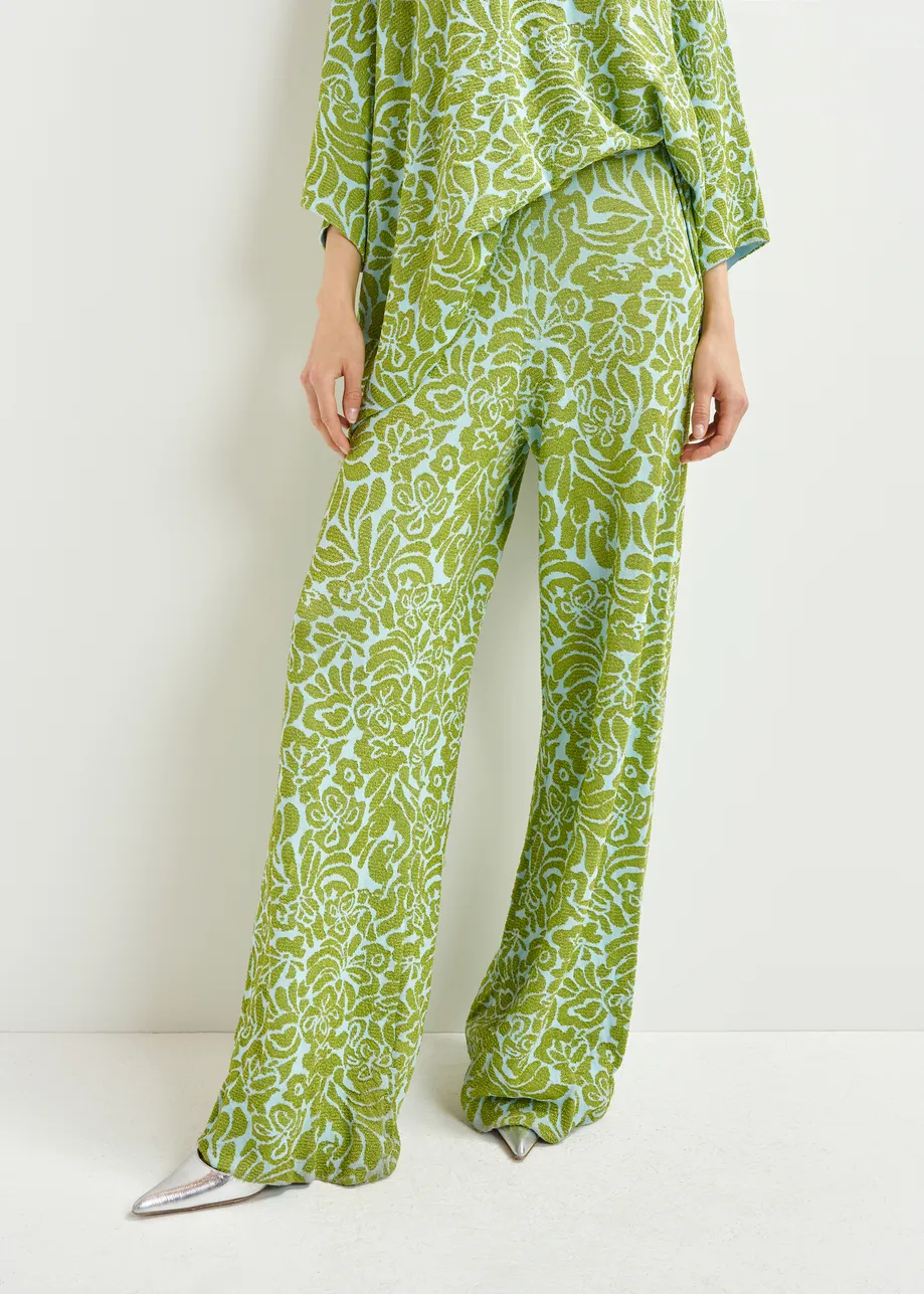 Groene en blauwe broek met olifantenpijpen in bloemenjacquard