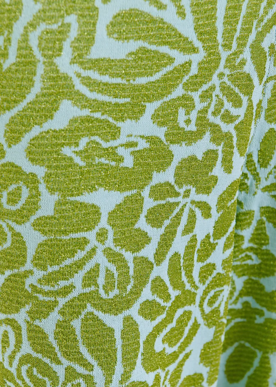 Groene en blauwe broek met olifantenpijpen in bloemenjacquard