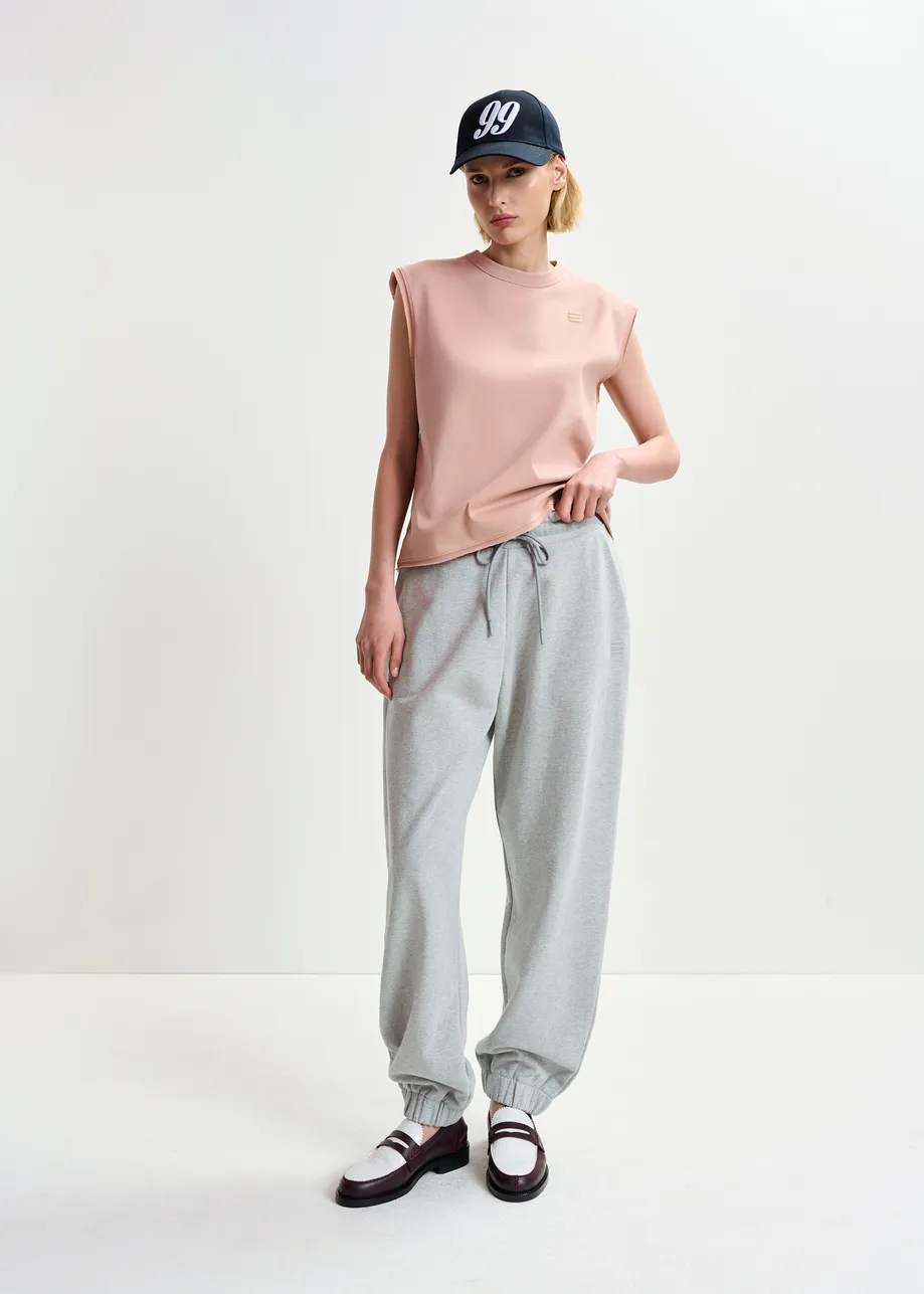 Grey organic cotton sweatpants with E-shaped embroidery