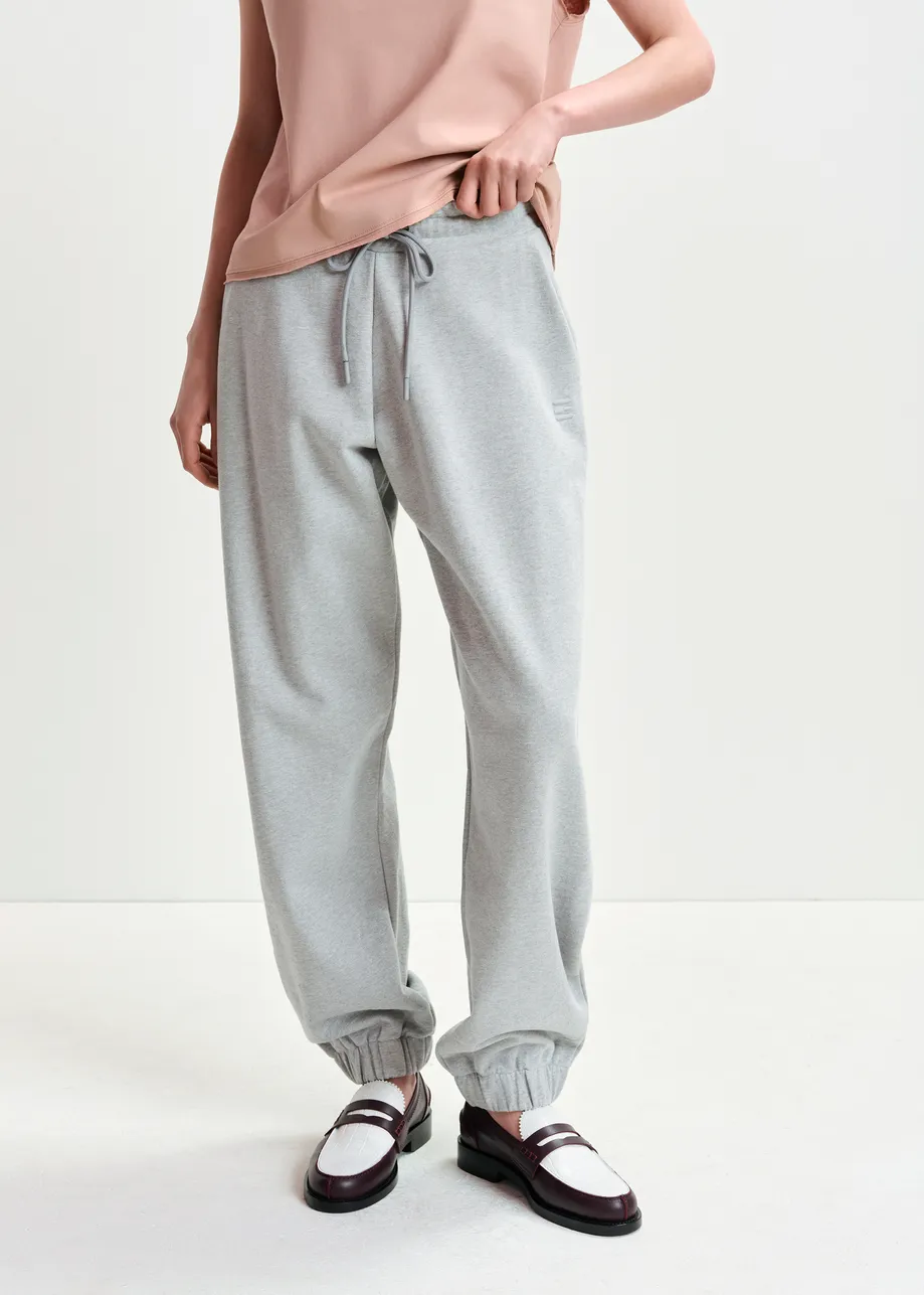 Grey organic cotton sweatpants with E-shaped embroidery