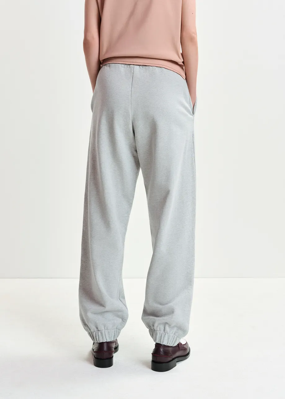 Grey organic cotton sweatpants with E-shaped embroidery