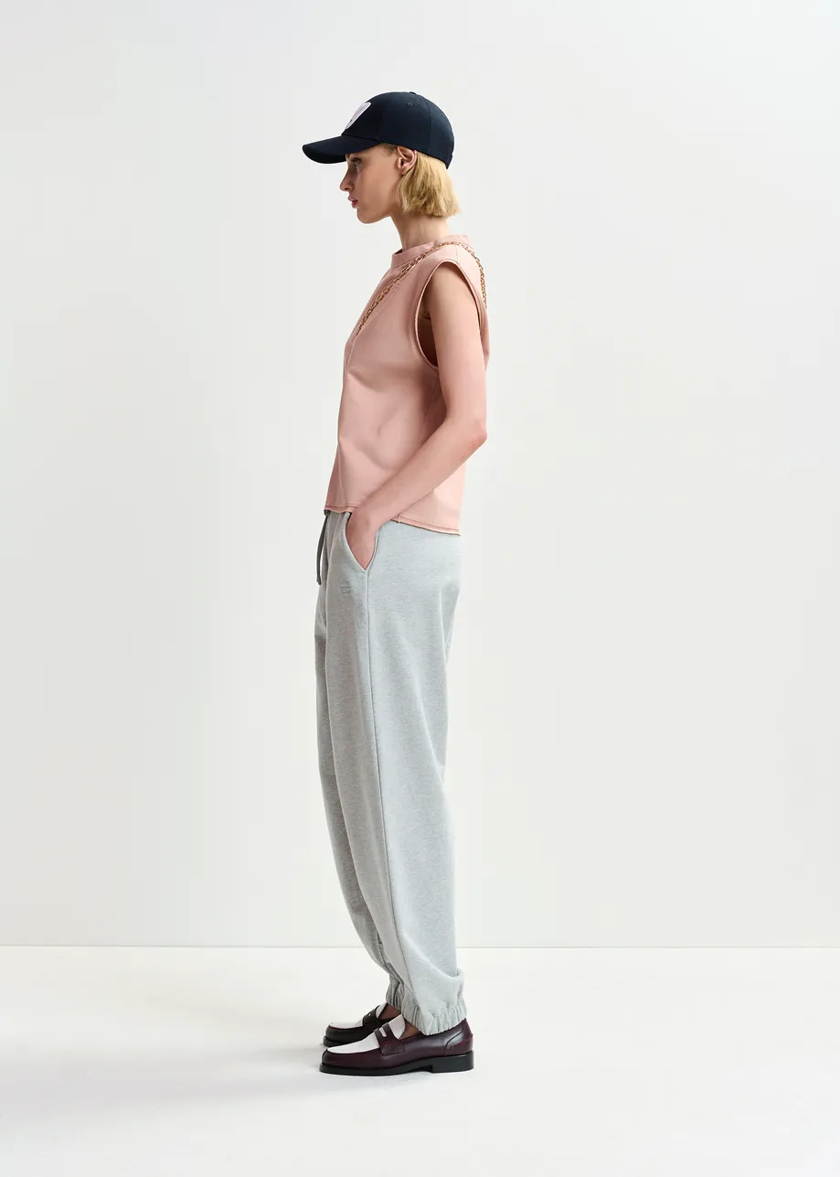 Grey organic cotton sweatpants with E-shaped embroidery