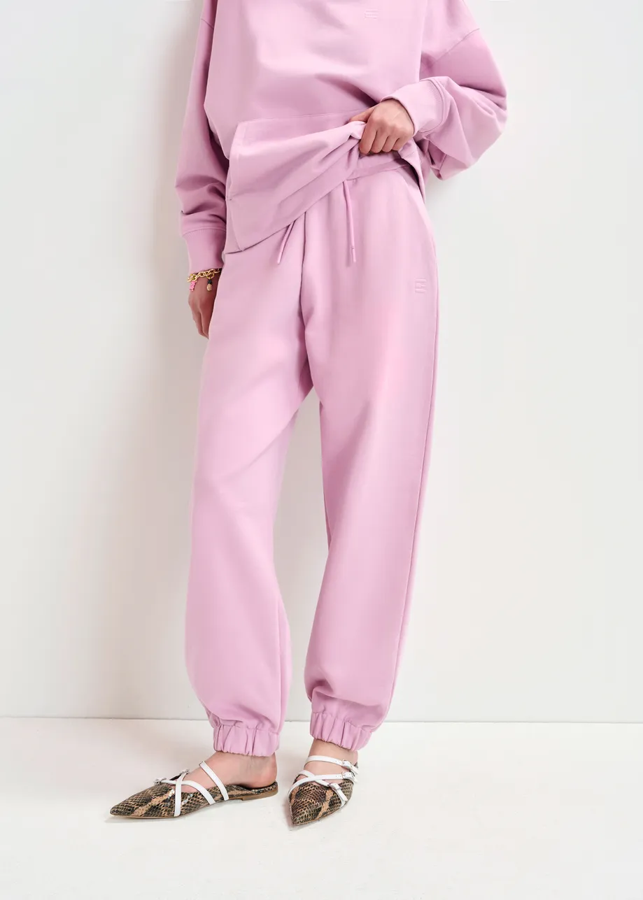 Pink organic cotton sweatpants with E-shaped embroidery