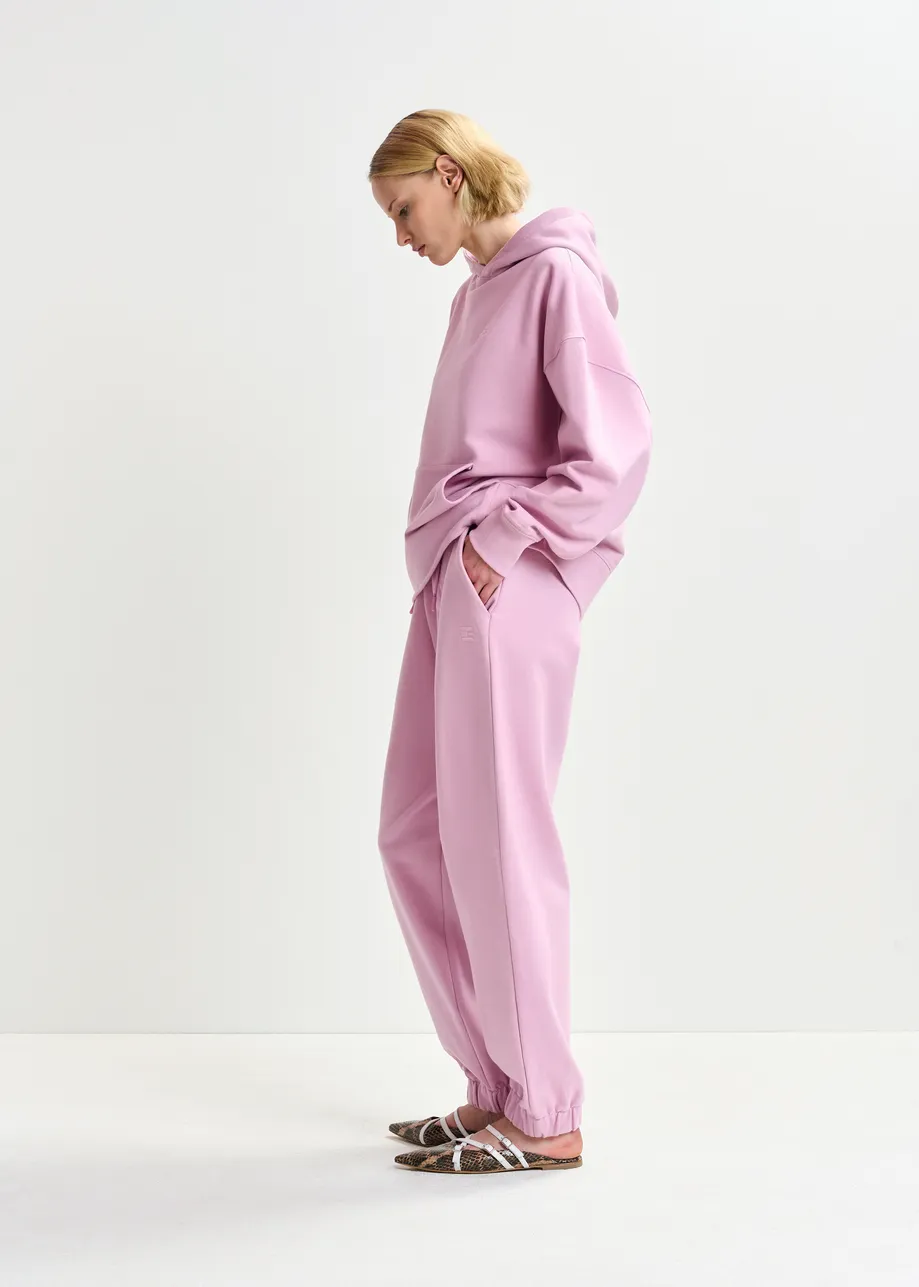 Pink organic cotton sweatpants with E-shaped embroidery