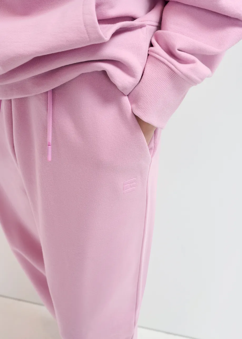 Pink organic cotton sweatpants with E-shaped embroidery