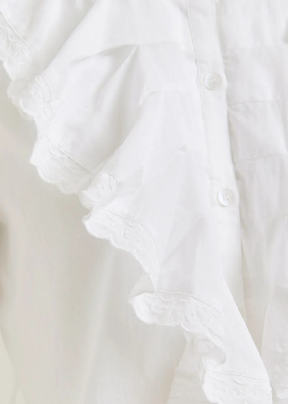 White cotton shirt with mandarin collar and ruffles