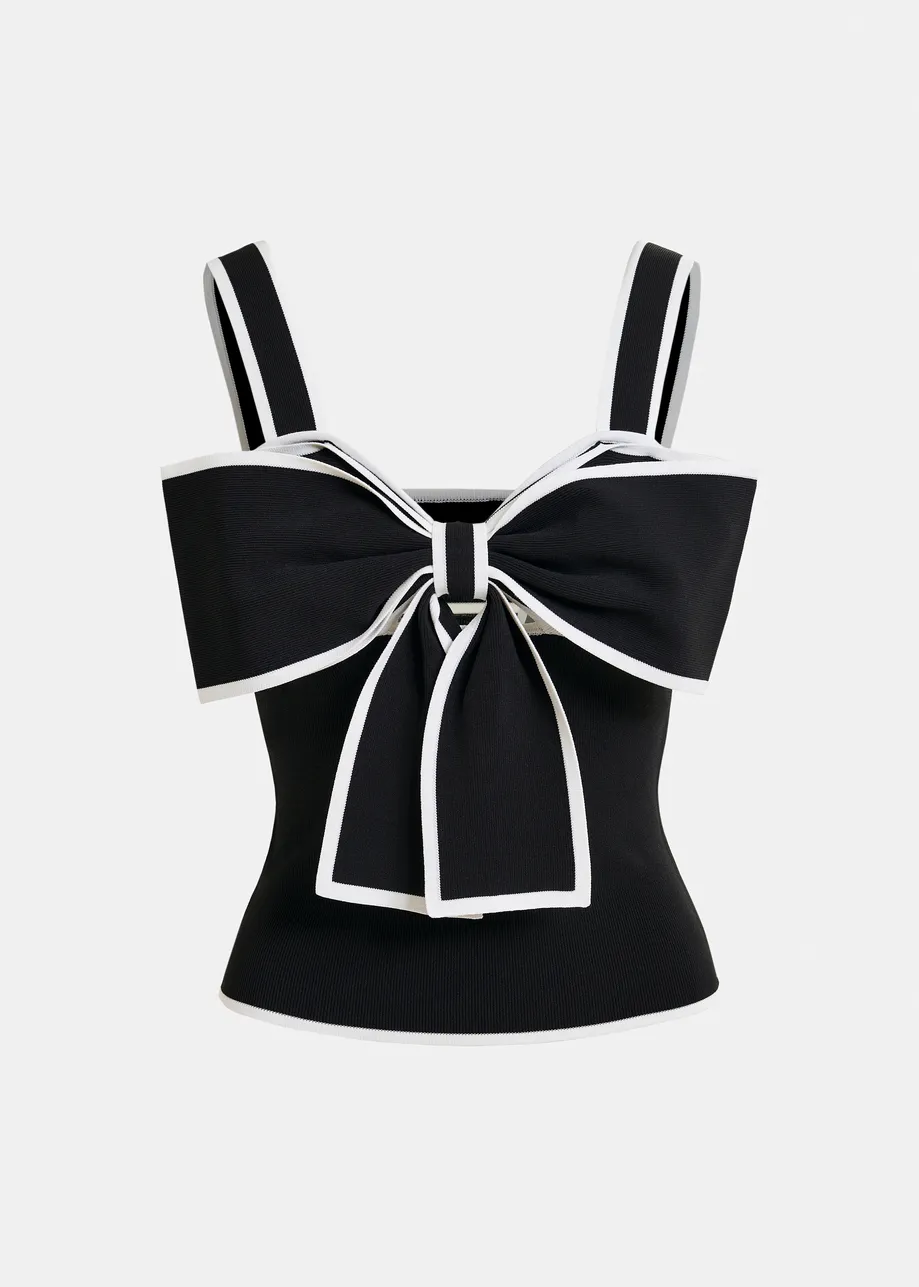 Black and white top with oversized bow and constrast trim