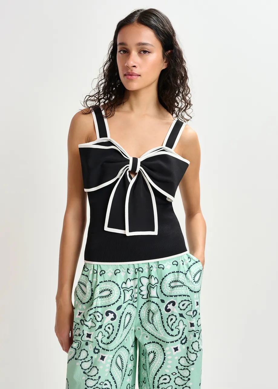 Black and white top with oversized bow and constrast trim