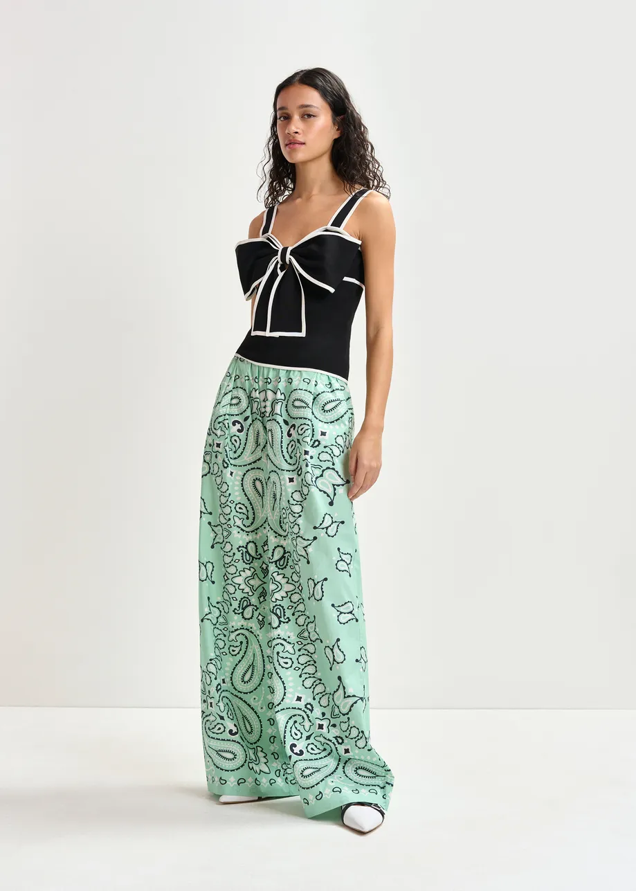 Black and white top with oversized bow and constrast trim