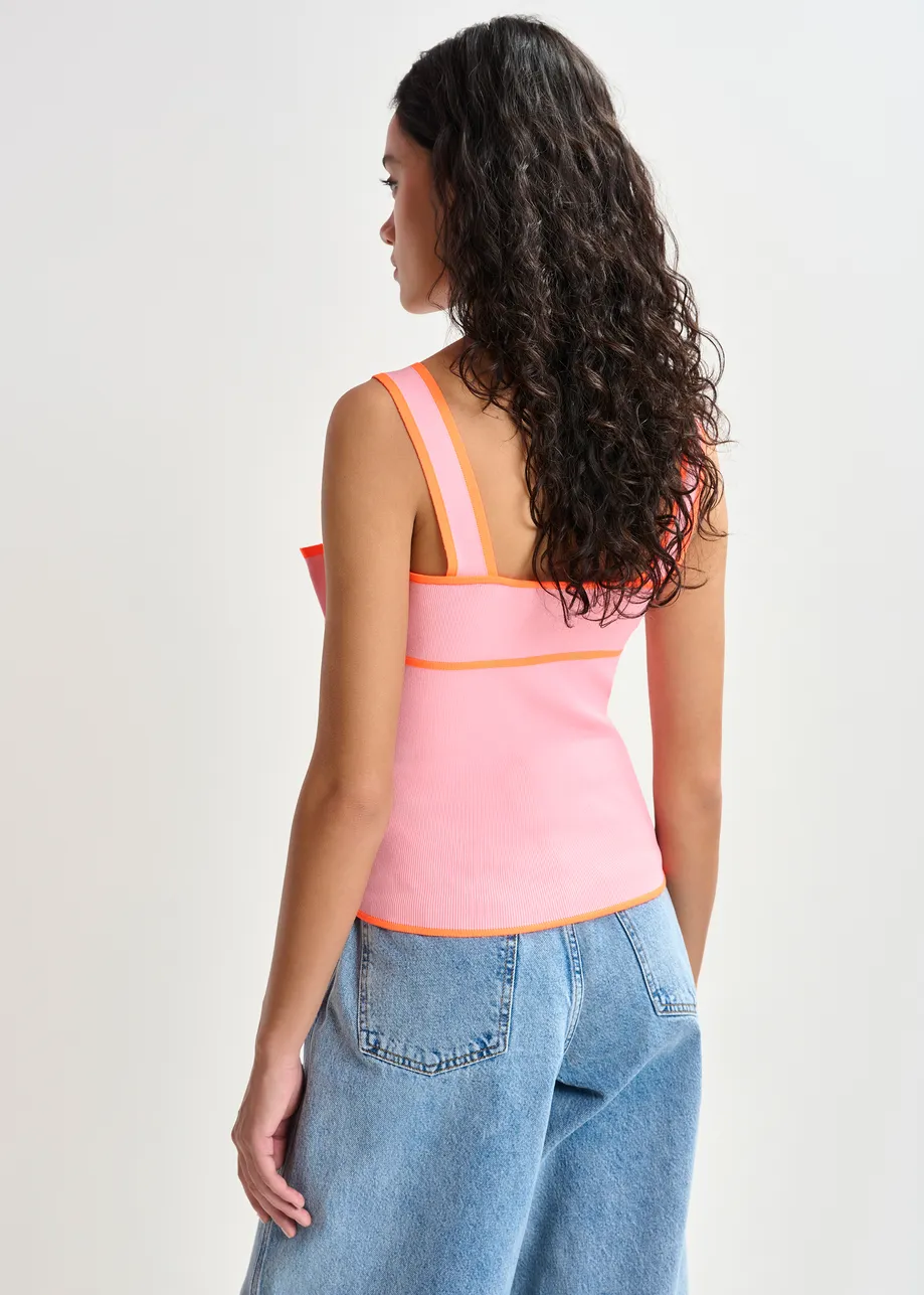 Pink and orange top with oversized bow and constrast trim