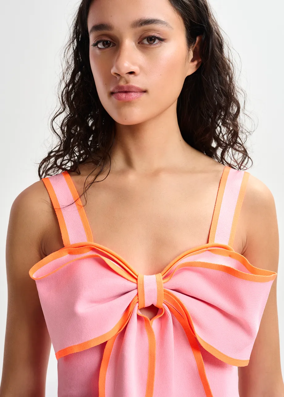 Pink and orange top with oversized bow and constrast trim