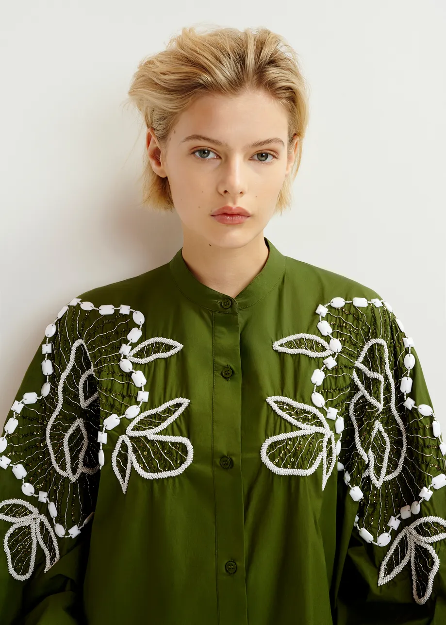 Khaki and white cotton shirt dress with bead embellishments and puffed sleeves