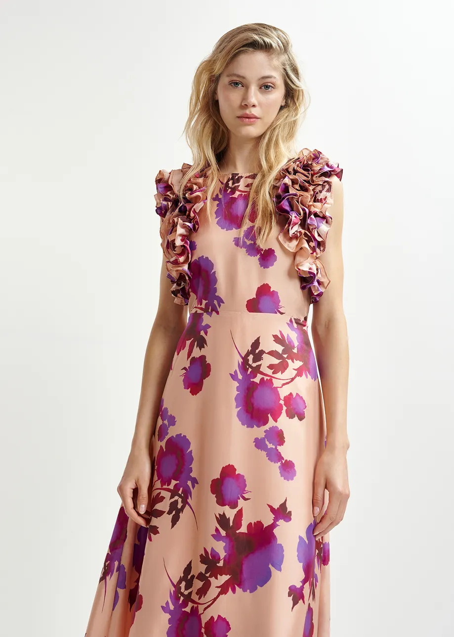 Robe mi-longue en soie fleurie vieux rose et violette à volants